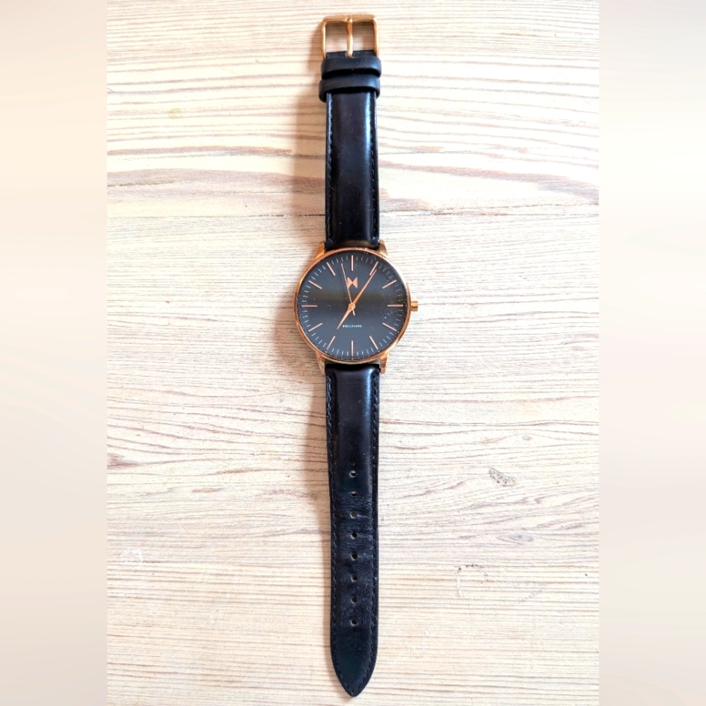 MVMT leather black and gold watch